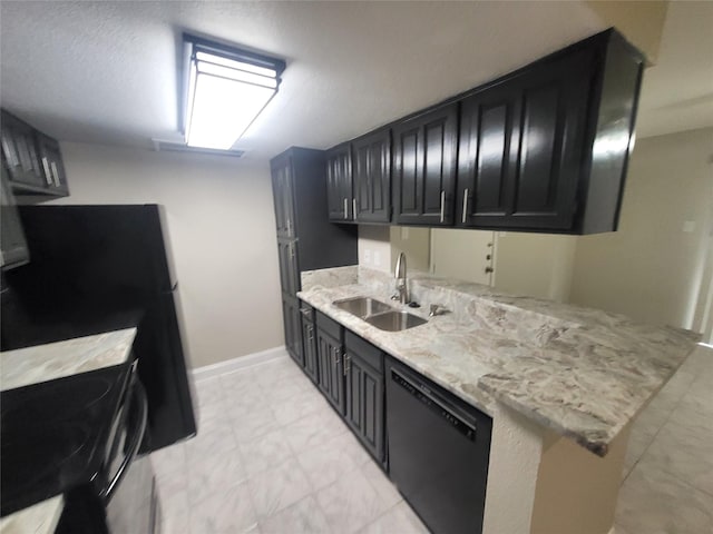 kitchen with black appliances, light stone countertops, kitchen peninsula, and sink