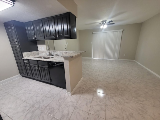 kitchen featuring light stone countertops, dishwasher, ceiling fan, and sink