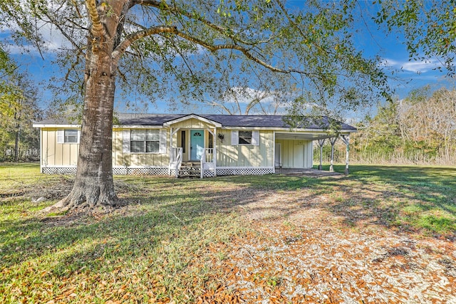 ranch-style home featuring a front yard