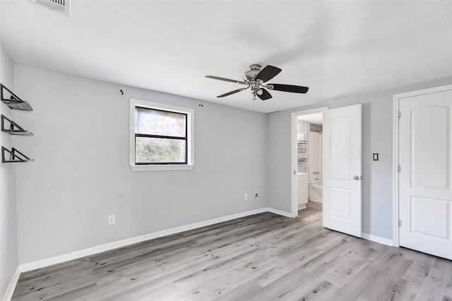 unfurnished bedroom featuring ceiling fan and light hardwood / wood-style floors