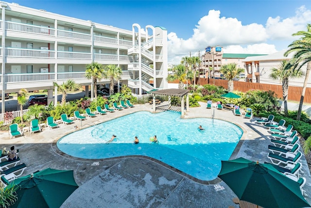 view of swimming pool featuring a patio