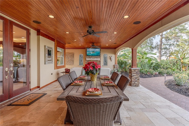 view of patio / terrace with ceiling fan and french doors