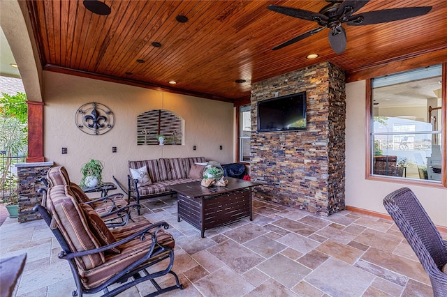 view of patio featuring an outdoor hangout area and ceiling fan