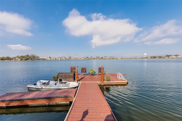 view of dock featuring a water view