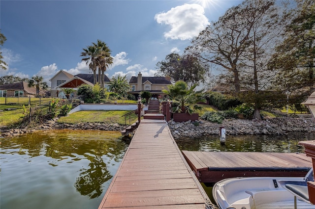 dock area featuring a water view