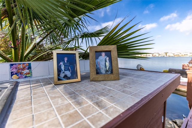 view of patio / terrace with a water view