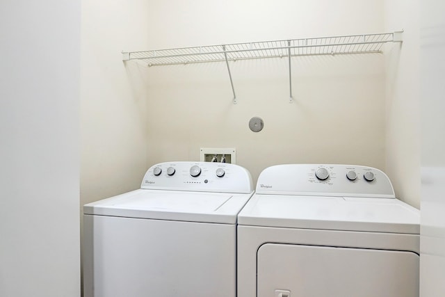 laundry room with washer and dryer