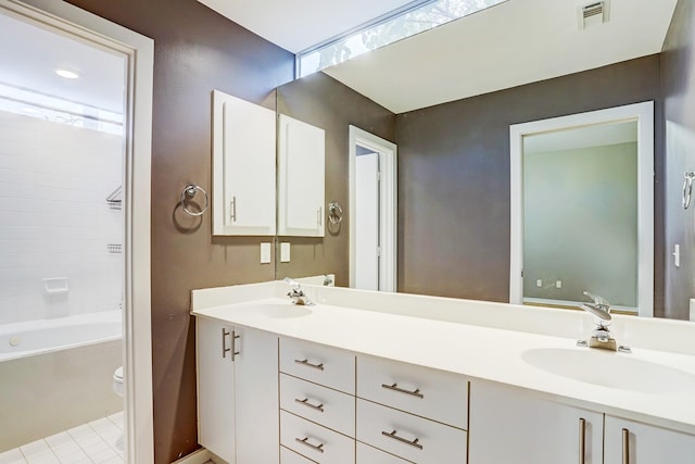 full bathroom featuring vanity, toilet, and shower / washtub combination