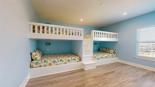 bedroom with light hardwood / wood-style floors