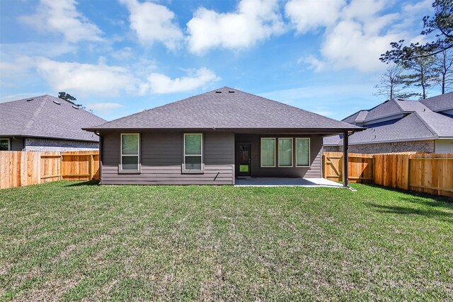 back of property featuring a patio area and a lawn