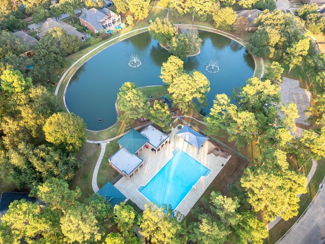 birds eye view of property featuring a water view