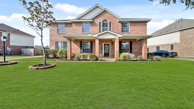 view of front of property featuring a front lawn