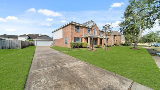 view of front of home featuring a front yard and a garage