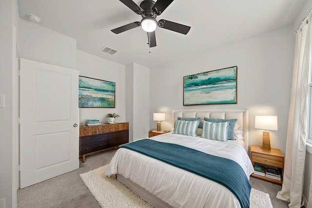 carpeted bedroom featuring ceiling fan