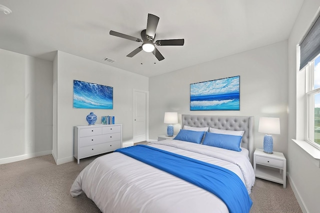 carpeted bedroom with ceiling fan