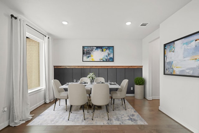 dining room with hardwood / wood-style flooring