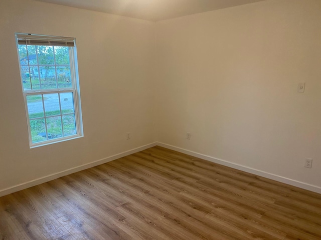 empty room featuring hardwood / wood-style floors