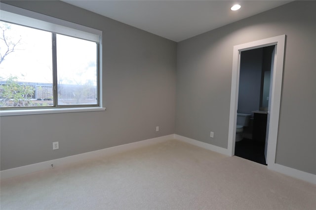 unfurnished room with carpet