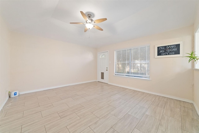 spare room with ceiling fan