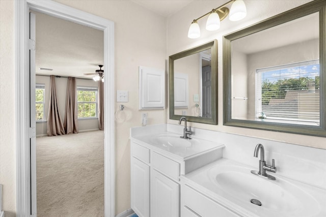 bathroom featuring vanity and ceiling fan