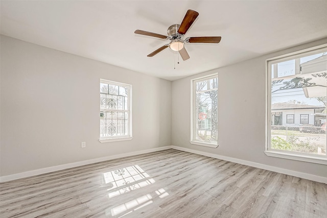 unfurnished room with light hardwood / wood-style floors and ceiling fan