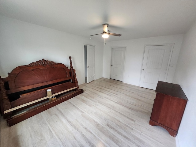 bedroom featuring ceiling fan and light hardwood / wood-style floors