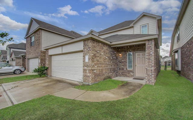 view of front of home featuring a garage and a front lawn