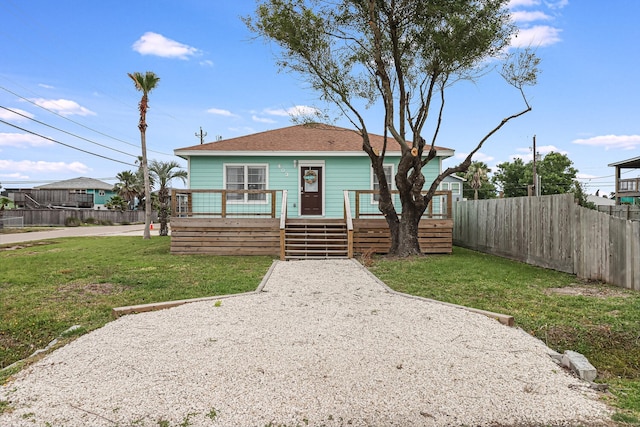 bungalow with a front lawn