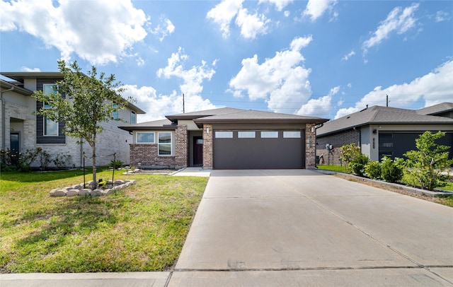 view of front facade with a front yard and a garage