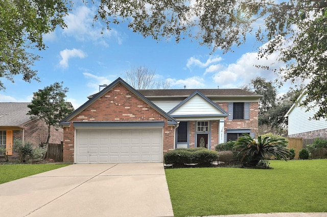 view of front of house with a garage and a front yard