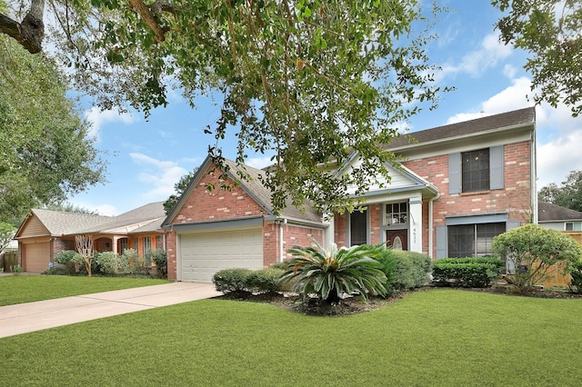 view of front of home with a garage and a front lawn