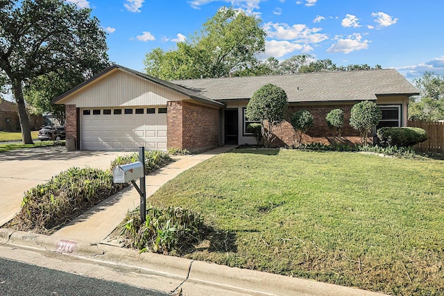 ranch-style home with a garage and a front lawn