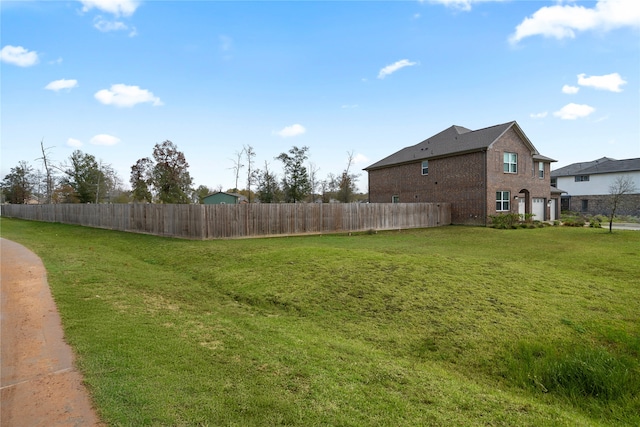 view of yard with a garage