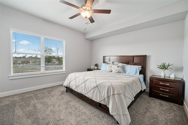 bedroom with ceiling fan and carpet floors