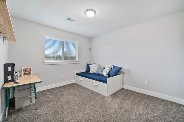 sitting room with dark carpet