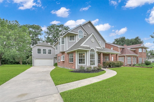 view of front facade with a garage and a front lawn