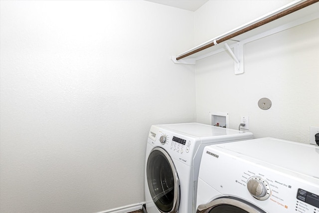 laundry area featuring washing machine and dryer