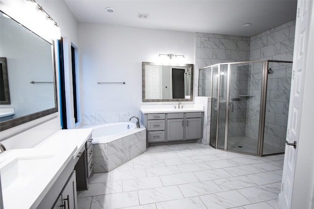 bathroom with shower with separate bathtub and vanity