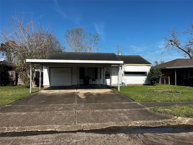 single story home featuring a garage and a front yard