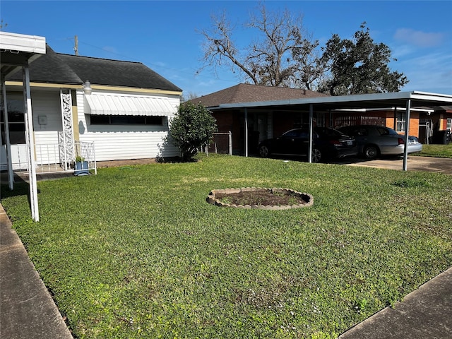 view of yard featuring a carport