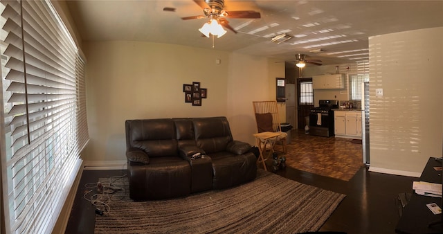 living room featuring dark parquet flooring