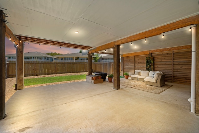 patio terrace at dusk with an outdoor hangout area