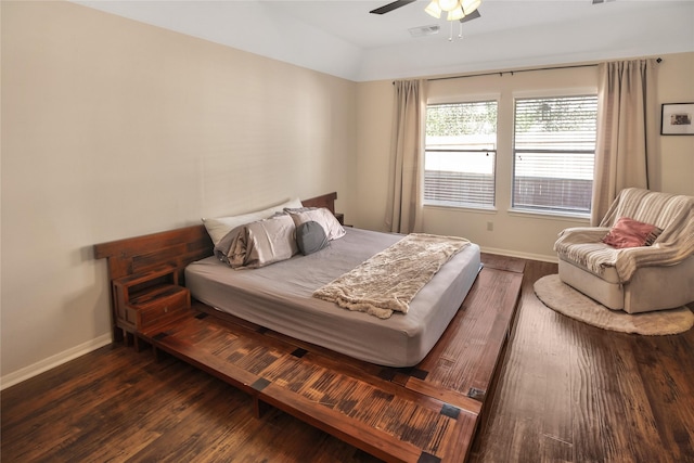 bedroom featuring ceiling fan and dark wood-type flooring