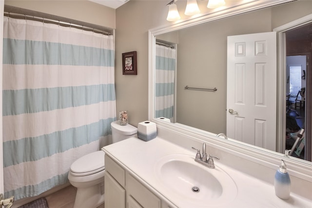 bathroom with walk in shower, tile patterned flooring, vanity, and toilet