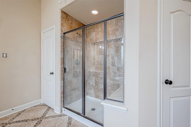 bathroom featuring an enclosed shower