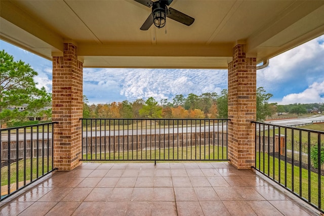 view of patio featuring ceiling fan