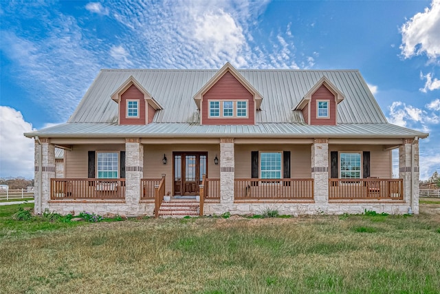 view of front facade featuring a front lawn and covered porch