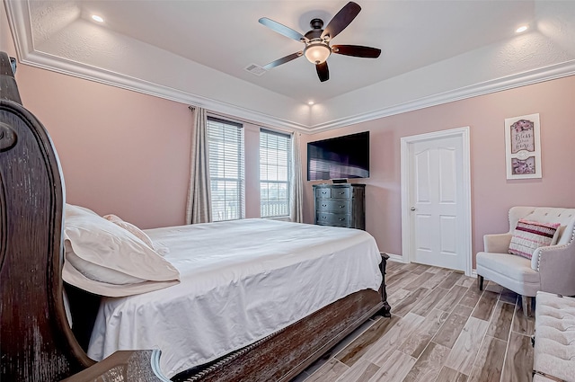 bedroom featuring ceiling fan and light hardwood / wood-style flooring