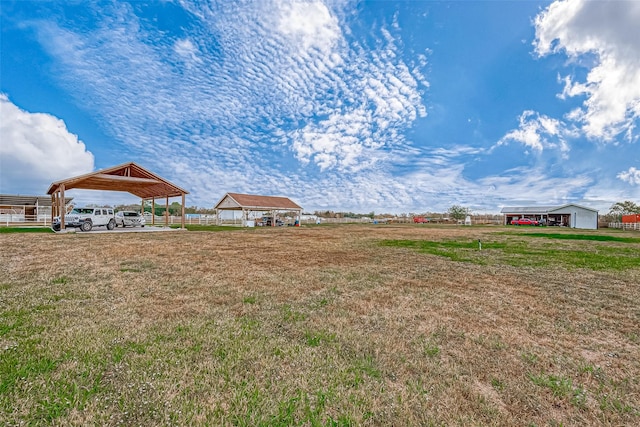 view of yard with a carport