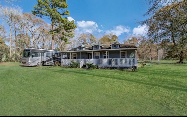 view of front of property with a porch and a front yard